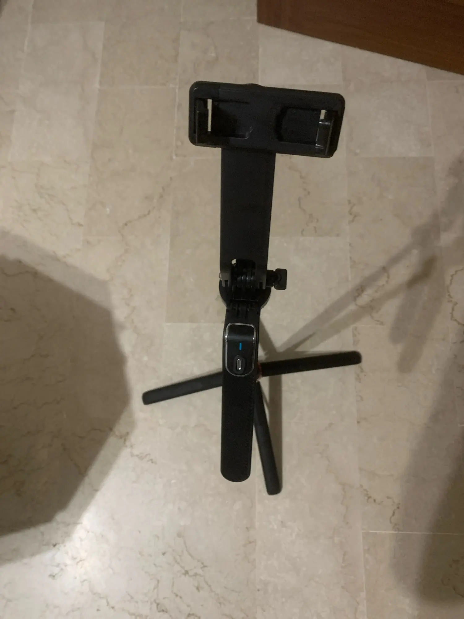 Portable camera tripod with wireless remote control and photo review